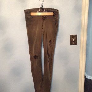Olive green ripped jeans